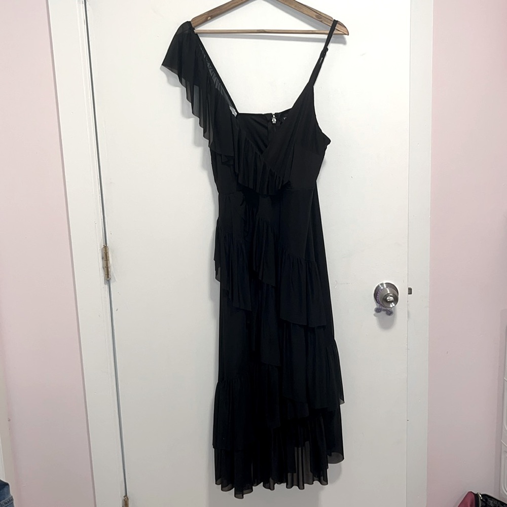 One time used. Torrid black dress in perfect condition.